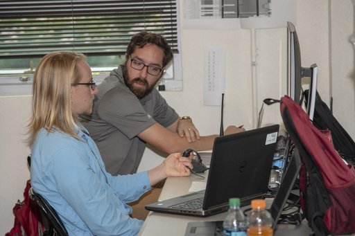 QSF18 Field Research Team Monitors Data from Flight