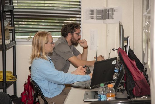 QSF18 Field Research Team Monitors Data from Flight