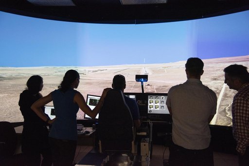 Astronauts Fly in X-57 Simulator at Armstrong Flight Research Center