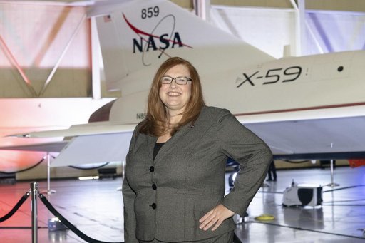 Project Manager Cathy Bahm Poses in Front of Unveiled X-59