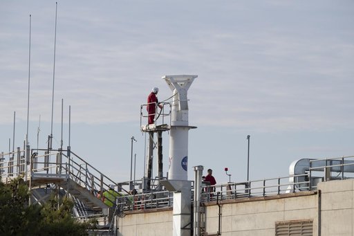 Helicopter Removes Historic Rooftop Pedestal