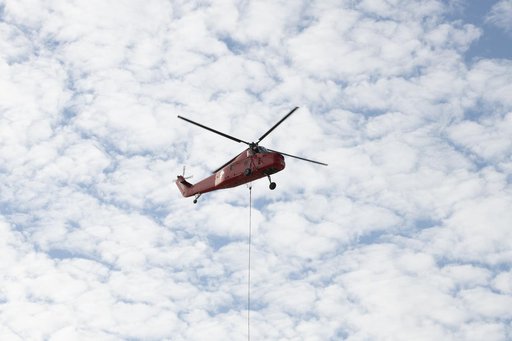 Helicopter Removes Historic Rooftop Pedestal