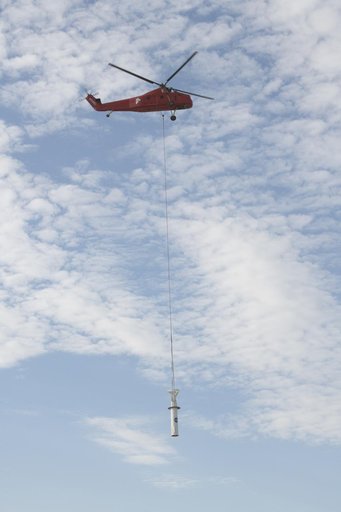 Helicopter Removes Historic Rooftop Pedestal