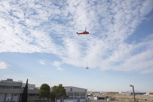 Helicopter Removes Historic Rooftop Pedestal