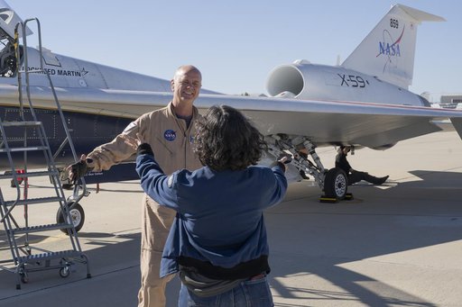 NASA’s X-59 Test Pilot Hugs Wife After Historic First Flight