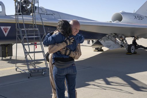 NASA’s X-59 Test Pilot Hugs Wife After Historic First Flight