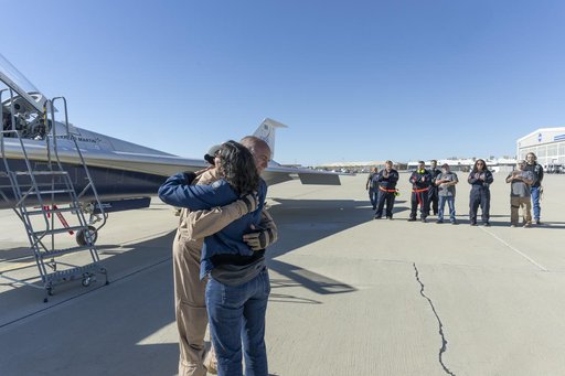 NASA’s X-59 Test Pilot Hugs Wife After Historic First Flight