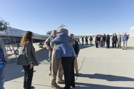NASA Leadership Gather Around X-59 After First Flight