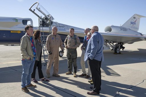 NASA Leadership Gather Around X-59 After First Flight