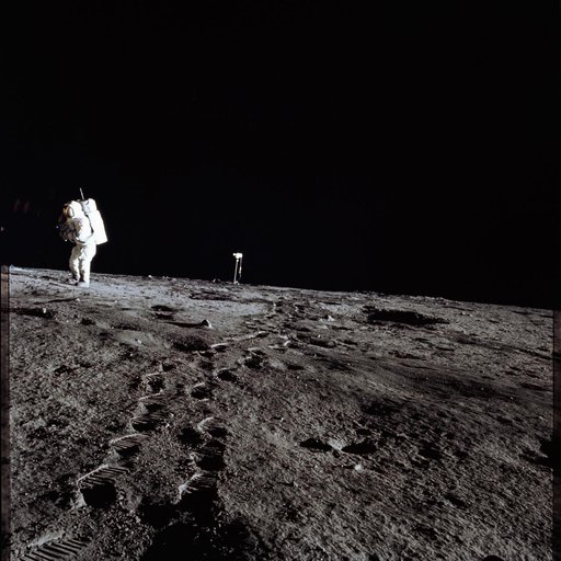 Apollo 12 Mission image - Photo of Al Bean and the TV taken from just inside the rim of Surveyor Crater