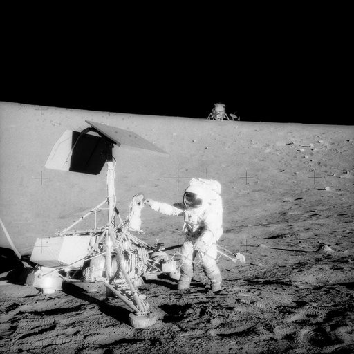 Apollo 12 Mission image - Astronaut Alan L. Bean,lunar module pilot,and two U.S. spacecraft