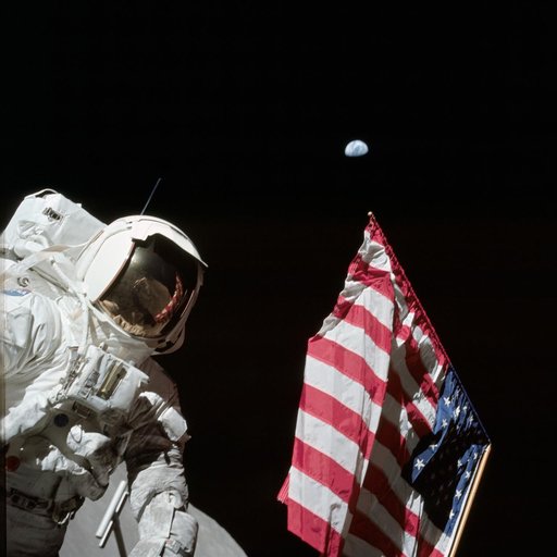 Astronaut Harrison Schmitt next to deployed U.S. flag on lunar surface