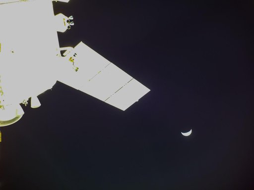 Artemis I FD 17 Orion and a Crescent Moon