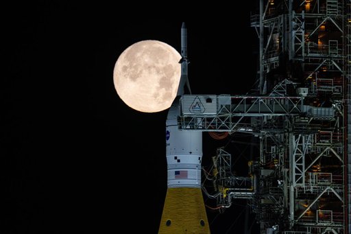 Full Moon Rising Over Full Artemis II Stack at Launch Pad 39B