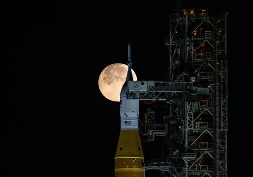 Full Moon Rising Over Full Artemis II Stack at Launch Pad 39B