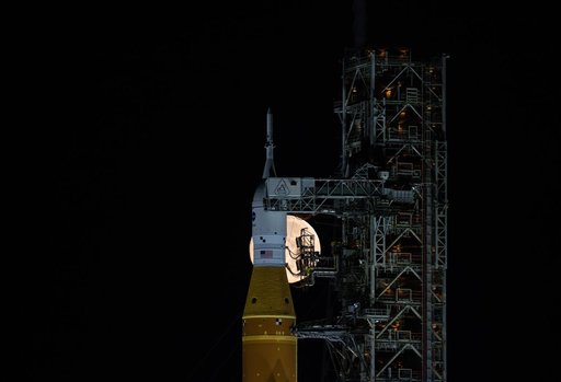 Full Moon Rising Over Full Artemis II Stack at Launch Pad 39B