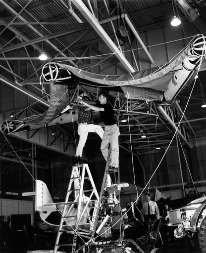 Technicians prepare the inflatable wing on Paresev 1-C