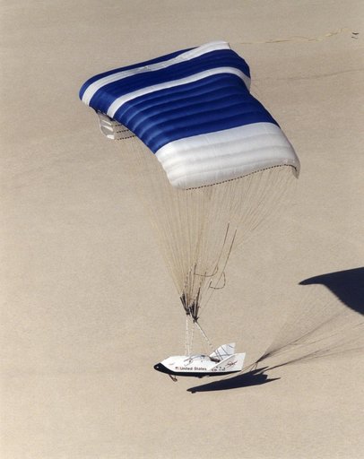 The X-38 Second Prototype Flares to a Landing over the Lakebed at the End of Its Fifth Flight at Edwards Air Force Base
