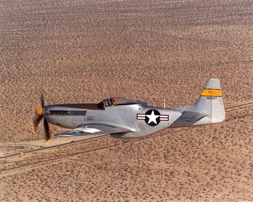 A restored NACA P-51D Mustang in flight