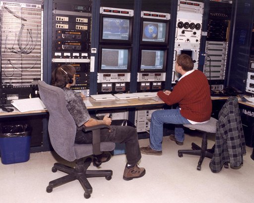 Mike Yettaw and Donavon Hoover providing air-to-ground communications to the Johnson Space Center