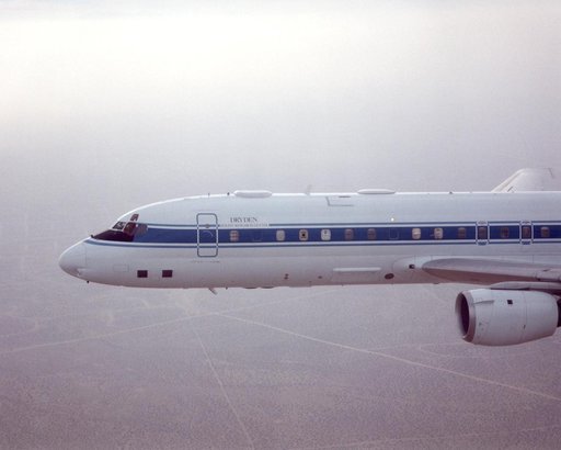 DC-8 returning from AFWEX deployment showing AeroSAPIENT Ku-band receive antenna (fwd zenith port)