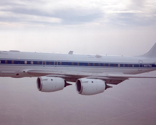 DC-8 returning from AFWEX deployment showing AeroSAPIENT Ku-band transmit antenna (aft 62 degree port)