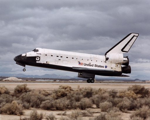 Space Shuttle Atlantis landing at 12:33 p.m. February 20, 2001, on the runway at Edwards Air Force Base, California, where NASA's Dryden Flight Research Center is located