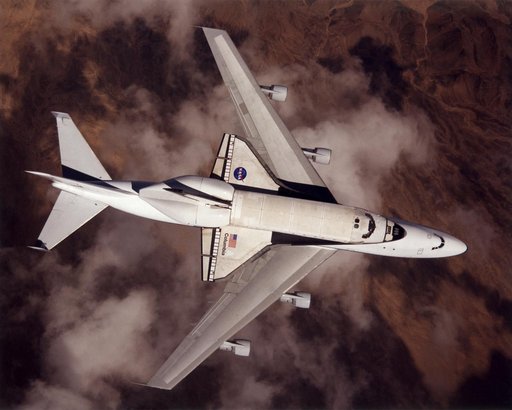 NASA space shuttle Columbia hitched a ride on a special 747 carrier aircraft for the flight from Palmdale, California, to Kennedy Space Center, Florida, on March 1, 2001
