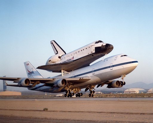 NASA's modified Boeing 747 Shuttle Carrier Aircraft with the Space Shuttle Endeavour on top lifts off to begin its ferry flight back to the Kennedy Space Center in Florida