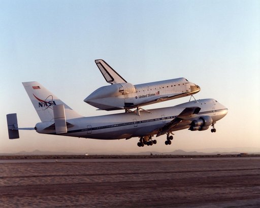 NASA's Boeing 747 SCA with the Space Shuttle Endeavour on top climbs out after takeoff from Edwards Air Force Base