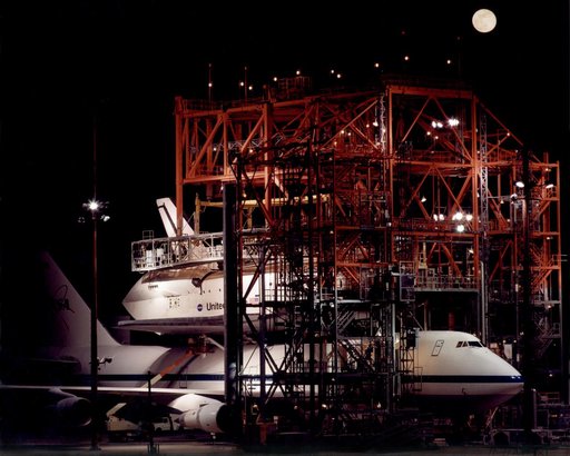 The Space Shuttle Endeavour receives post-flight servicing in the Mate-Demate Device (MDD) at NASA's Dryden Flight Research Center, Edwards, California