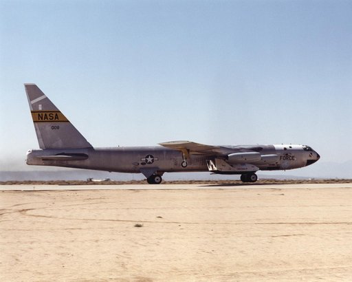 NASA's B-52 takes the X-38 aloft for the seventh free flight of the program, July 10, 2001