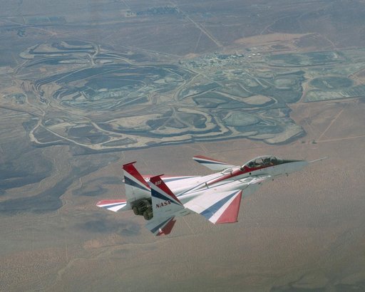 NASA Dryden's highly modified F-15B, tail number 837, seen here with the Boron Mine as a backdrop, resumed Intelligent Flight Control System (IFCS) project flights on Dec. 6, 2002.