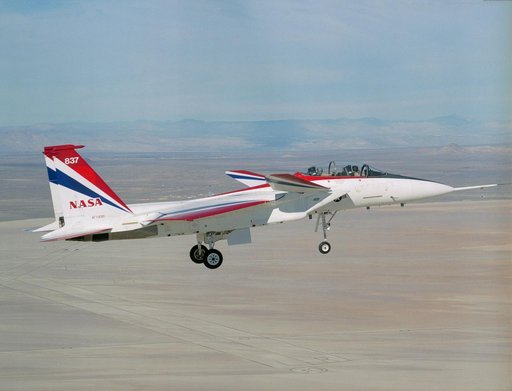 This view from a NASA Dryden F-18 chase aircraft shows Dryden's highly modified F-15B, tail number 837, which resumed Intelligent Flight Control System (IFCS) project flights on Dec. 6, 2002.