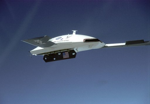 X-45A Air Vehicle #1 during flight #13, with weapons bay door open