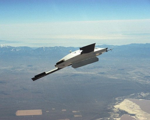 X-45A Air Vehicle #1 during flight #13, with weapons bay door open