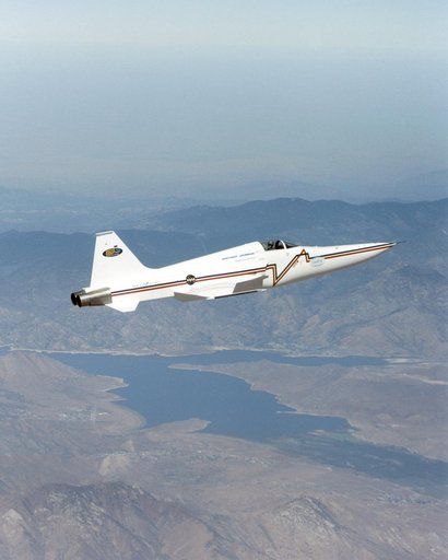 Northrop Grumman Corporation's modified U.S. Navy F-5E Shaped Sonic Boom Demonstration (SSBD) aircraft flies over Lake Isabella, Calif., on Aug. 4, 2003