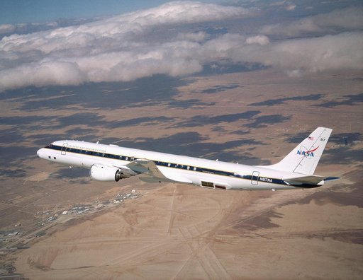 NASA's Airborne Science DC-8, displaying new colors in a check flight Feb. 24, 2004, over the Dryden Flight Research Center