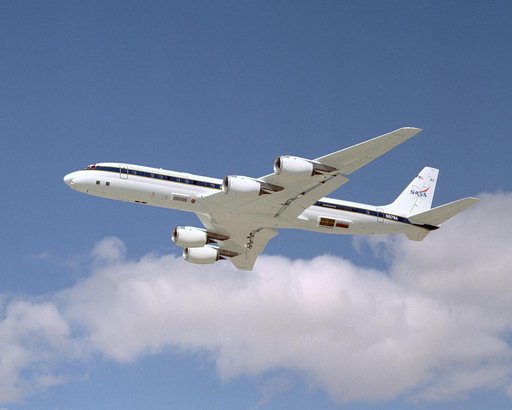 NASA's DC-8 Airborne Science research aircraft, in new colors and markings, takes off Feb. 24, 2004