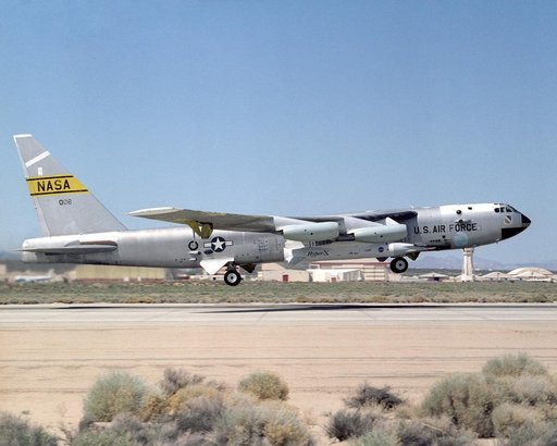 NASA's B-52B launch aircraft takes off carrying the second X-43A hypersonic research vehicle attached to a modified Pegasus rocket, on March 27, 2004