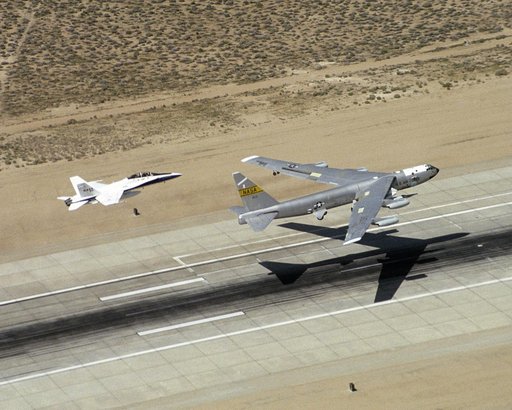 NASA's B-52B launch aircraft takes off carrying the second X-43A hypersonic research vehicle attached to a modified Pegasus rocket, on March 27, 2004