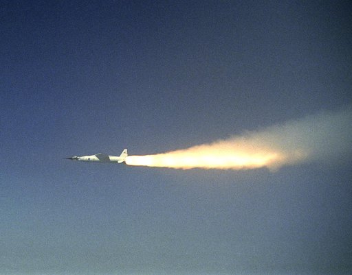 A modified Pegasus rocket ignites moments after release from the B-52B, beginning the acceleration of the X-43A over the Pacific Ocean on March 27, 2004