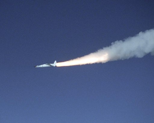 A modified Pegasus rocket ignites moments after release from the B-52B, beginning the acceleration of the X-43A over the Pacific Ocean on Nov. 16, 2004
