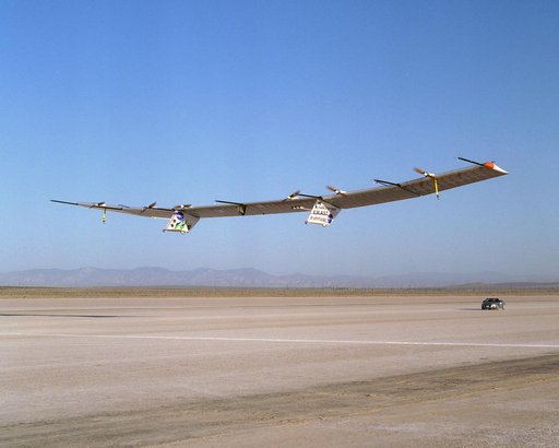 The Pathfinder-Plus solar-electric flying wing lifts off Rogers Dry Lake adjoining NASA Dryden Flight Research Center on a turbulence-measurement flight.