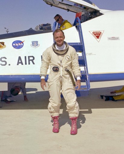 NASA test pilot Bill Dana, resplendent in pink boots and pressure suit, was all smiles following the last powered flight of the X-24B on Sept. 23, 1975.
