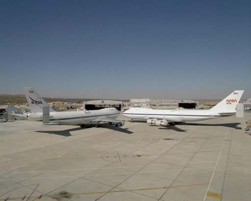 NASA's two modified Boeing 747 Shuttle Carrier Aircraft #911 (left) and #905 (right) were nose-to-nose on the ramp at NASA Dryden in this 1995 photo