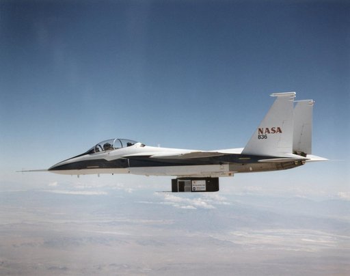 F-15B in flight with X-33 Thermal Protection Systems (TPS) on Flight Test Fixture