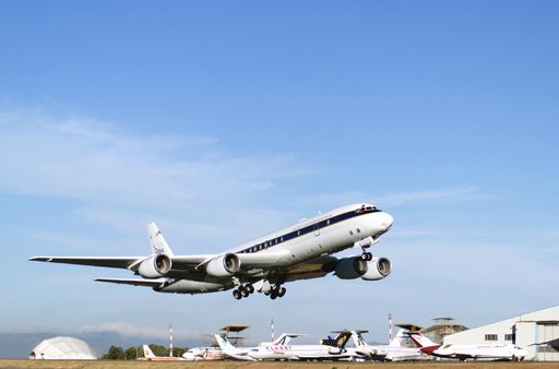 NASA's DC-8 flying laboratory takes off from Juan Santamaria International Airport in San Jose, Costa Rica, on NASA's AirSAR 2004 campaign