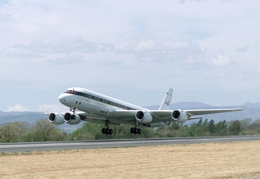 NASA's DC-8 flying laboratory takes off from Juan Santamaria International Airport in San Jose, Costa Rica, on NASA's AirSAR 2004 campaign