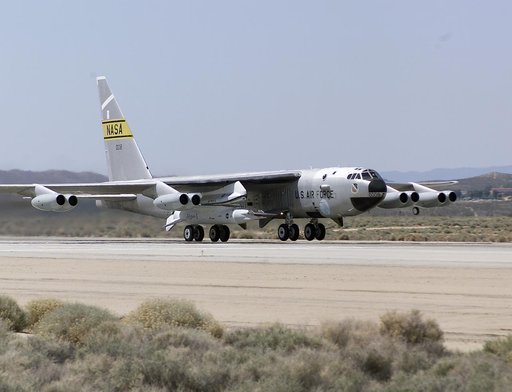 NASA's B-52B launch aircraft takes off carrying the second X-43A hypersonic research vehicle attached to a modified Pegasus rocket, on March 27, 2004